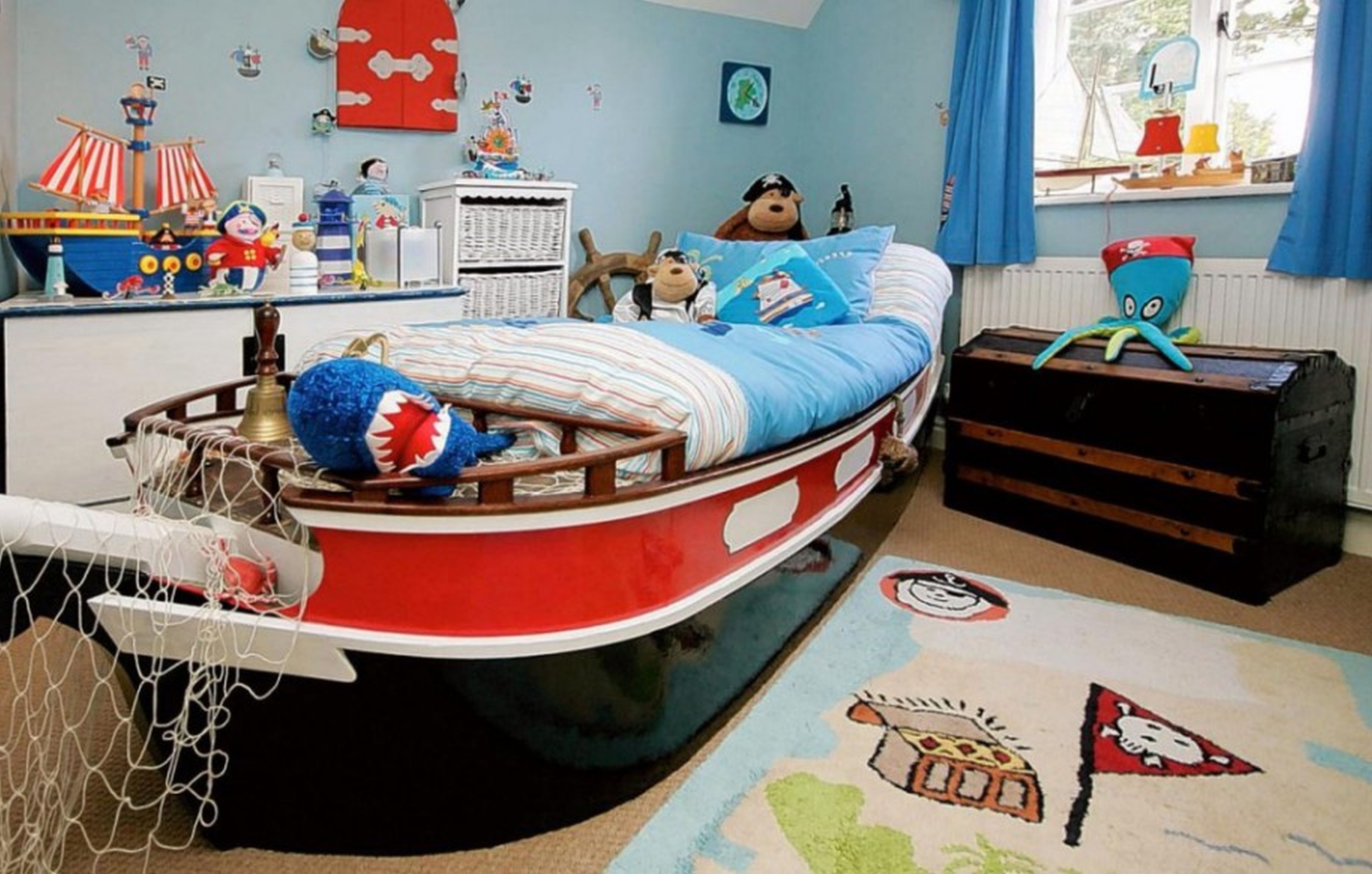 Foto del diseño de una habitación infantil en estilo marino para niño