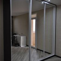 meuble d'angle de style dans le salon en bois photo