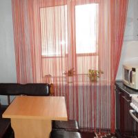rideaux de fil inhabituels à l'intérieur de la photo de la cuisine