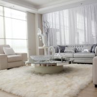 sofá blanco en el interior de la habitación photo