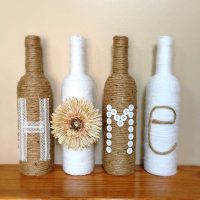 version d'une belle décoration de bouteilles de champagne avec photo ficelle