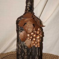 l'idée d'une belle décoration de bouteilles de verre en cuir avec photo de vos propres mains
