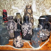 version à faire soi-même d'une décoration chic de bouteilles en cuir