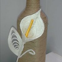 version de la décoration originale de bouteilles de champagne avec photo ficelle