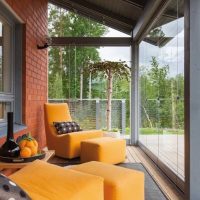 l'idée d'un style inhabituel de la véranda dans la maison photo