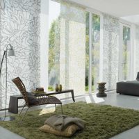 Exemple d'utilisation de rideaux modernes dans une salle de photo au design lumineux