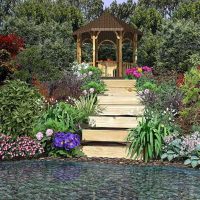 Un exemple d'utilisation de belles plantes dans l'aménagement paysager d'une maison d'été