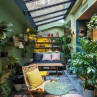 possibilité d'utiliser de belles idées pour la décoration d'un jardin d'hiver dans une photo de maison