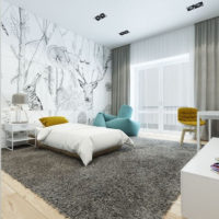 Chambre spacieuse avec des peintures murales au mur