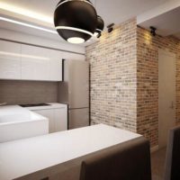 Mur de briques dans le style loft de la cuisine d'odnushka