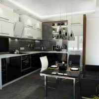 La cuisine d'un homme d'affaires dans les tons sombres