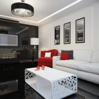Rouge comme accent dans une chambre en noir et blanc