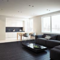 Plancher noir dans la conception du salon d'une maison privée