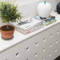 Écran de radiateur à trous ronds