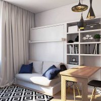 Petit canapé dans le salon du studio
