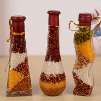 Belles bouteilles de céréales pour la cuisine