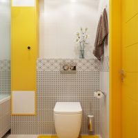 Acentos amarillos en un baño moderno