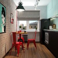 Sillas rojas en la cocina tipo loft.