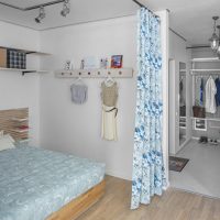 Zonage de la chambre avec des rideaux