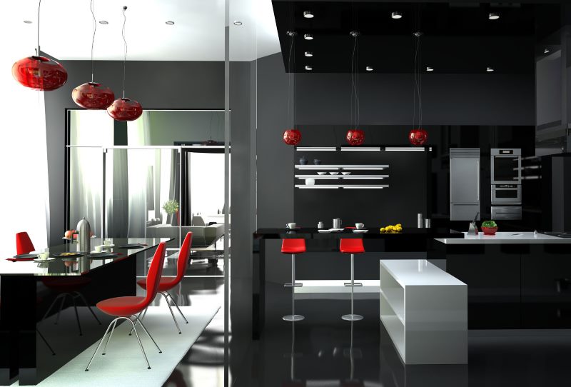 Suspension rouge dans la cuisine noire