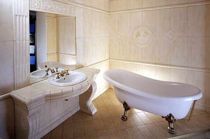 Lavabo de porcelana en mueble de mármol