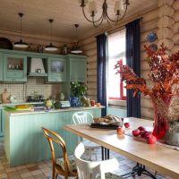 Conception d'une cuisine-salon dans une maison en rondins