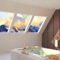 Salle de bain design dans les combles d'une maison de campagne