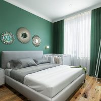 Cama gris en una habitación moderna