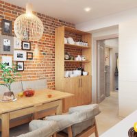 Mur de briques dans la cuisine d'un appartement dans une maison à panneaux
