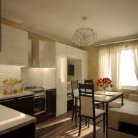 Cuisine moderne avec canapé contre le mur
