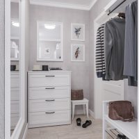 Commode blanche à l'intérieur du couloir
