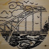 Panel sobre un árbol de hilos y claveles.