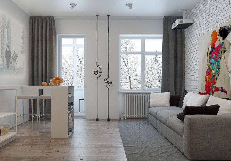 Cuisine-salon intérieur avec porte de balcon