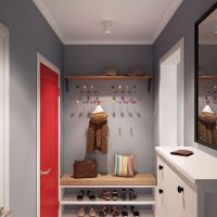 Porte rouge dans le couloir gris